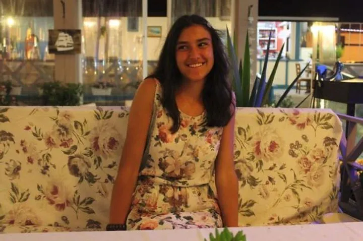 Girl vs. floral couch
